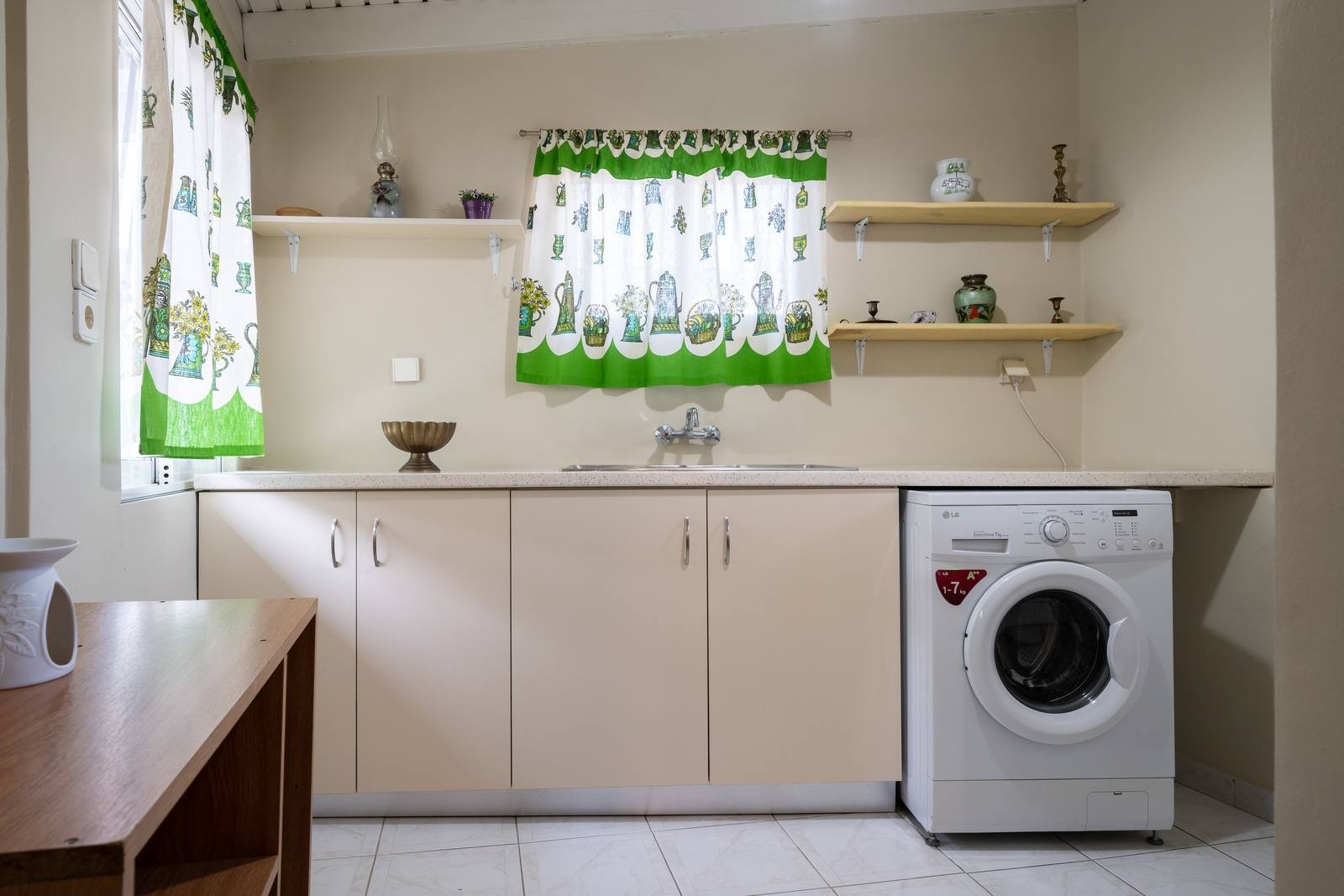Second-floor kitchen with washing machine